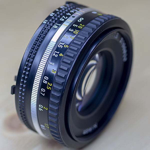 니콘 Nikon NIKKOR MF 50mm 1:1.8 Ais  1.5피트(0.45미터) 근접 초점거리/95%