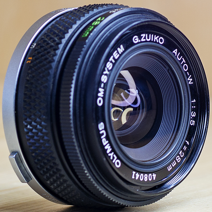 올림푸스 Olympus OM-SYSTEM f=28mm 1:3.5 G.Zuiko Auto-W/93%
